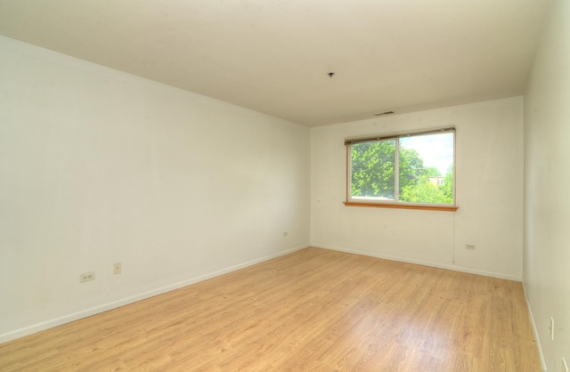 empty room featuring light hardwood / wood-style flooring