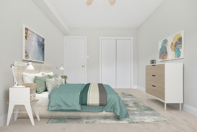 bedroom with carpet floors, a closet, and ceiling fan