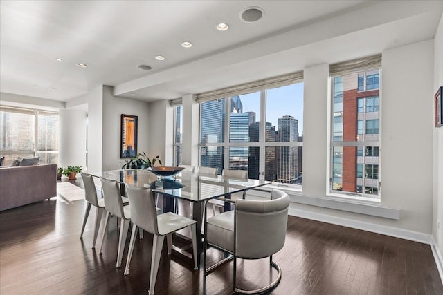 dining area featuring dark hardwood / wood-style floors and a wealth of natural light