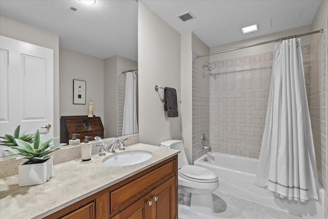 full bathroom with tile patterned flooring, vanity, shower / bath combo, and toilet