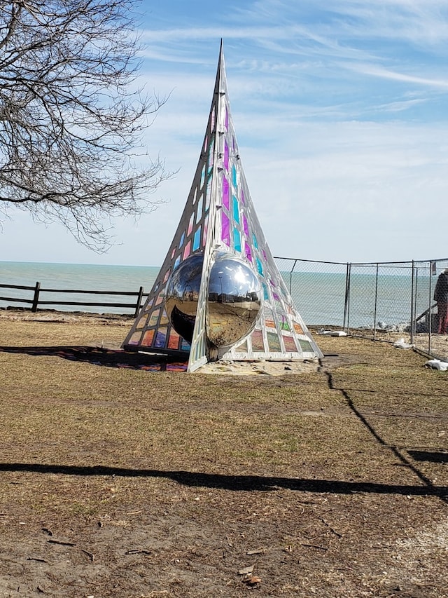 view of playground featuring a water view