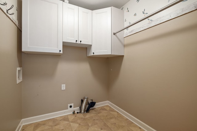 laundry area with cabinets, hookup for a washing machine, and electric dryer hookup