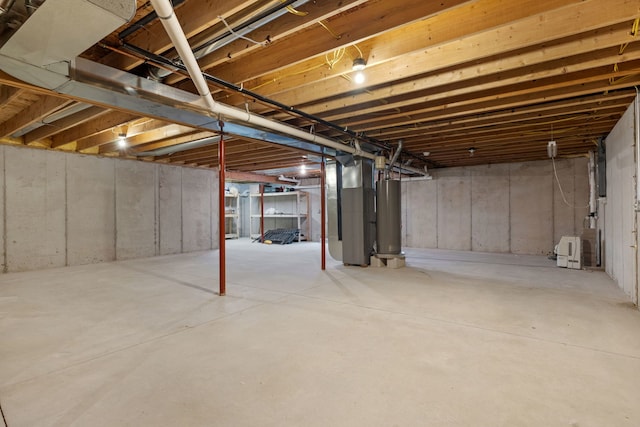 basement with gas water heater and heating unit