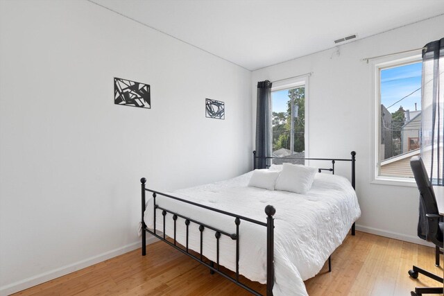 bedroom featuring light hardwood / wood-style flooring