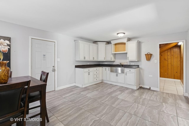 kitchen with sink and white cabinets