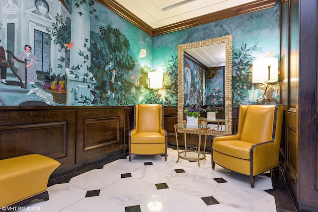 sitting room featuring crown molding