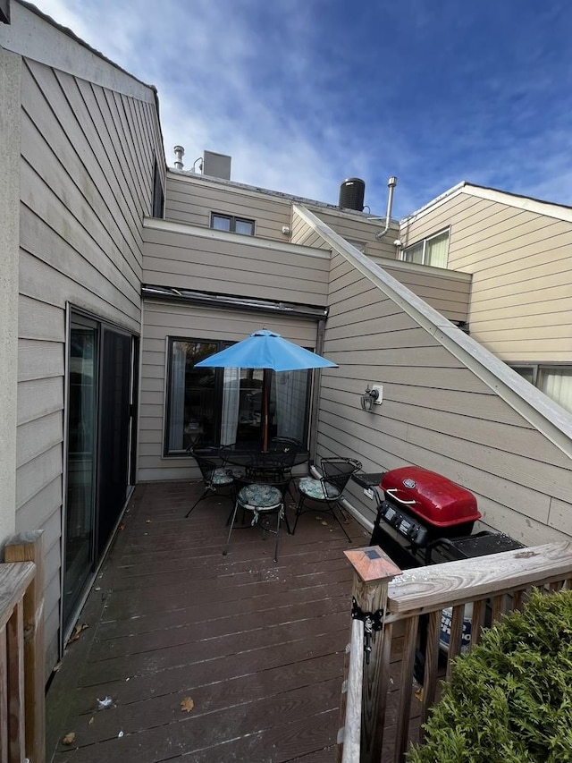 wooden deck with grilling area