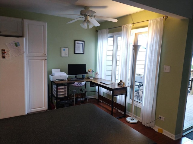 home office featuring ceiling fan and wood-type flooring