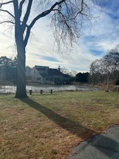 view of yard with a water view