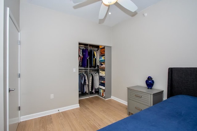 bedroom with ceiling fan, a closet, and light wood-type flooring