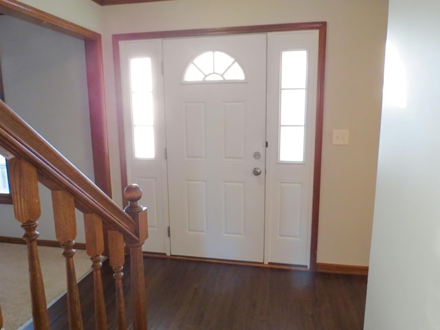 foyer entrance featuring dark hardwood / wood-style flooring