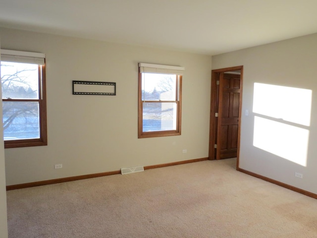 view of carpeted spare room