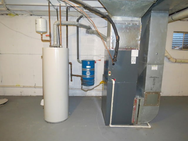 utility room featuring heating unit and water heater