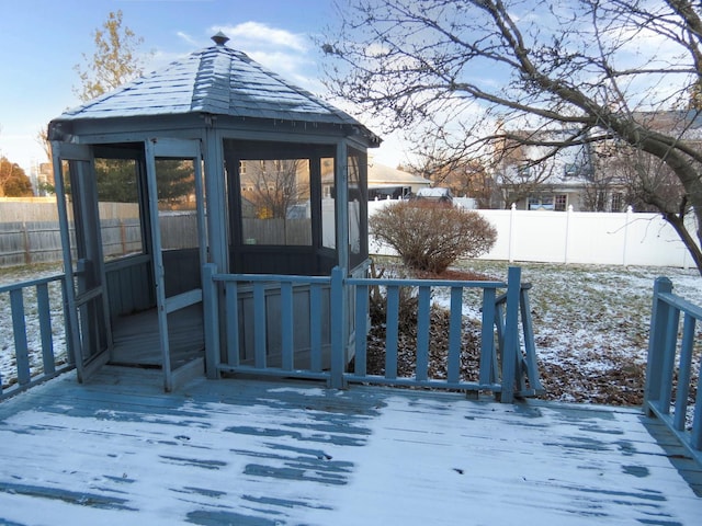 view of snow covered deck