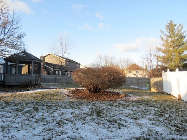 view of yard covered in snow