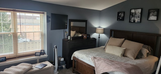 bedroom with vaulted ceiling