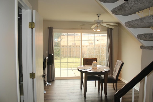 dining room featuring ceiling fan and hardwood / wood-style floors