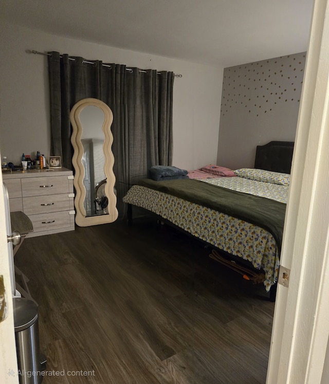 bedroom featuring dark hardwood / wood-style flooring