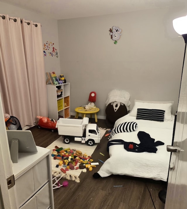 bedroom featuring hardwood / wood-style flooring