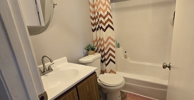 full bathroom featuring vanity, toilet, and shower / bath combo