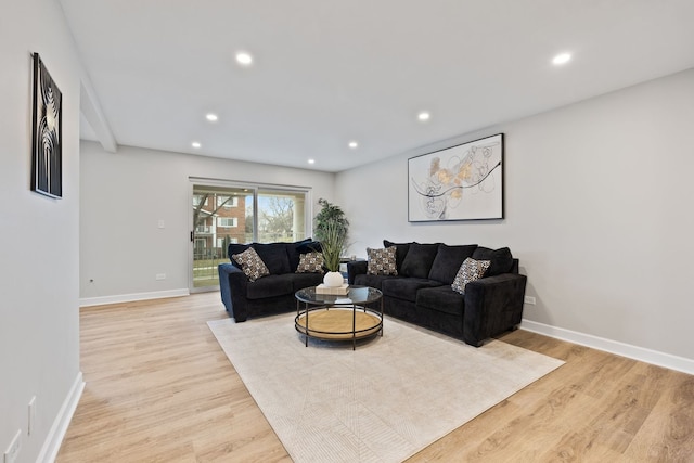 living room with light hardwood / wood-style floors