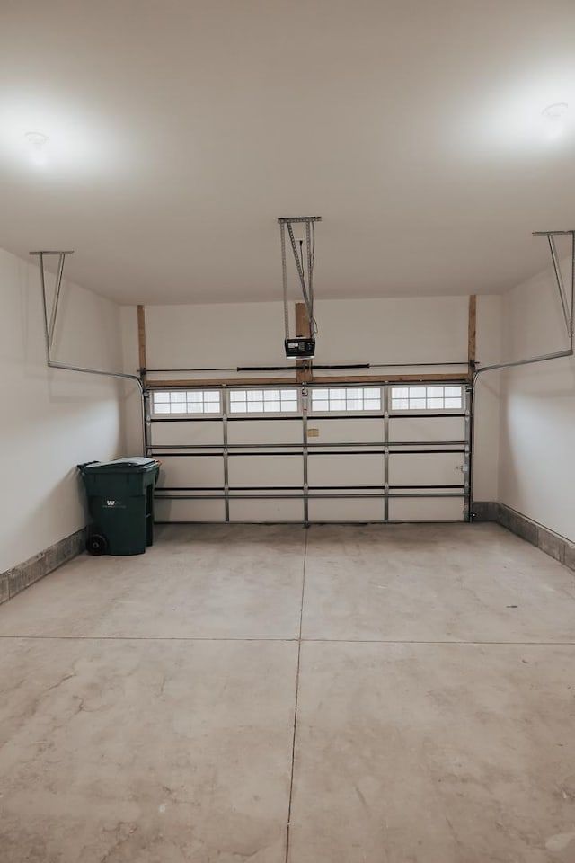 garage featuring a garage door opener