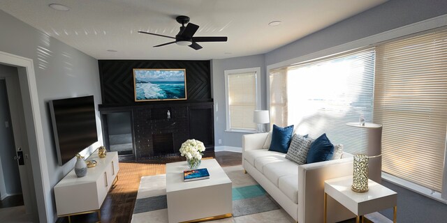 interior space featuring ceiling fan and dark hardwood / wood-style flooring