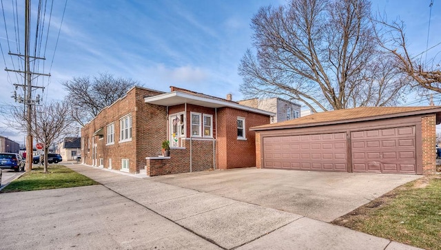 view of home's exterior featuring an outdoor structure and a garage