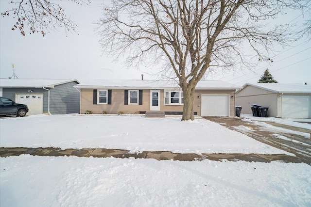 single story home with a garage