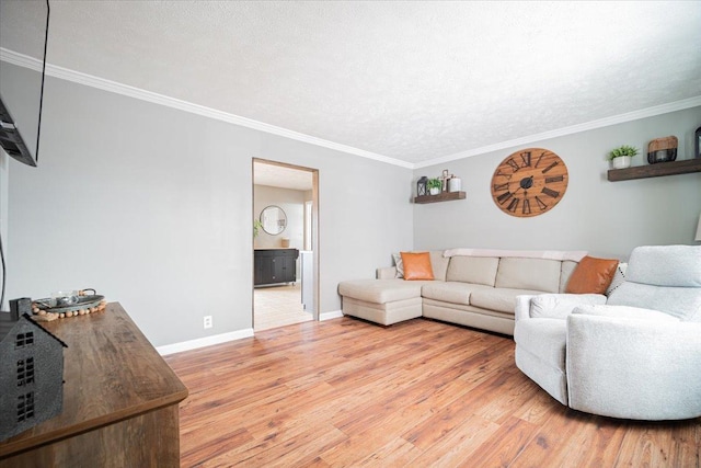 living room with a textured ceiling, light hardwood / wood-style flooring, and crown molding