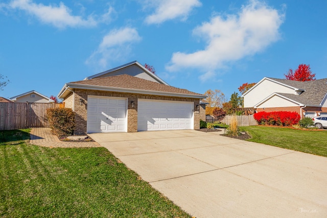 view of home's exterior with a yard and a garage