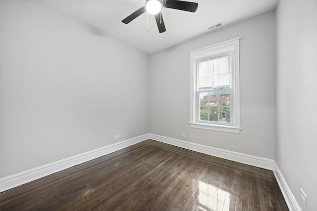 empty room featuring ceiling fan and hardwood / wood-style flooring