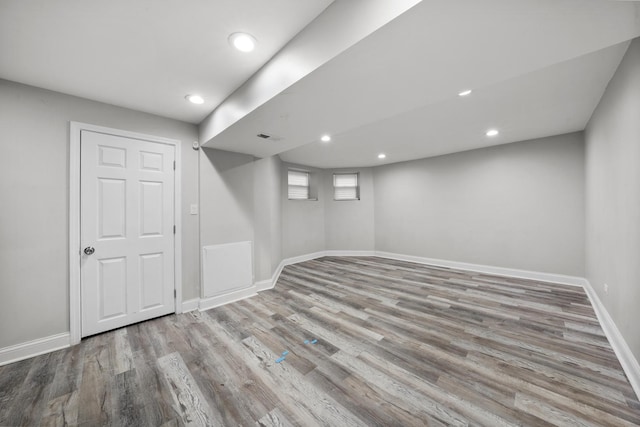 basement featuring light wood-type flooring