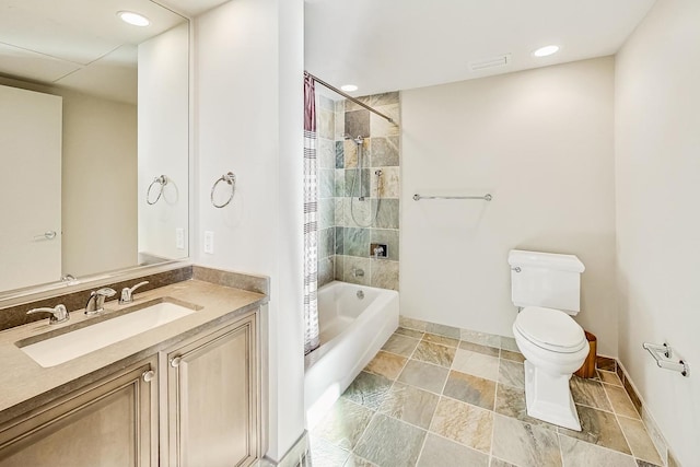 full bathroom with shower / bath combo with shower curtain, vanity, and toilet