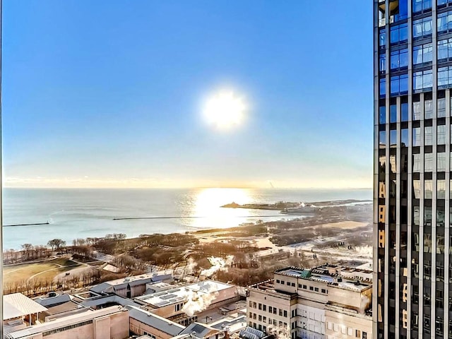 property's view of city with a water view