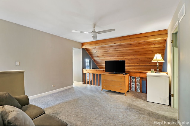 carpeted living room with ceiling fan, wooden ceiling, and lofted ceiling