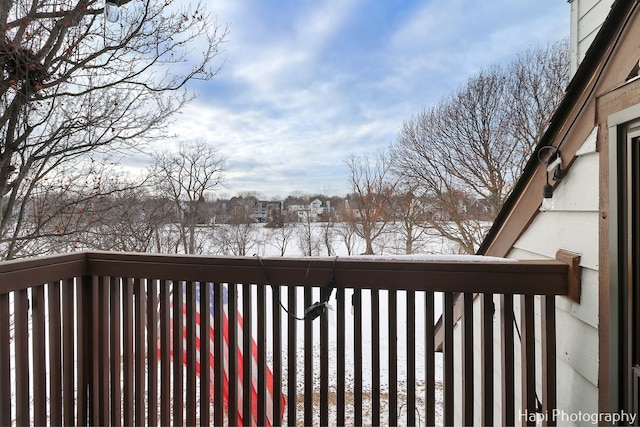 view of snow covered deck