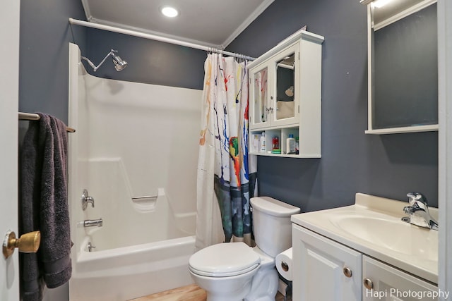 full bathroom featuring shower / bathtub combination with curtain, crown molding, vanity, and toilet