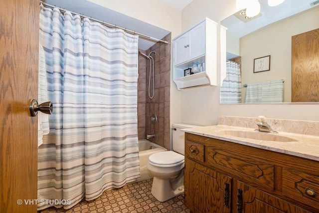 full bathroom with shower / bath combination with curtain, vanity, and toilet