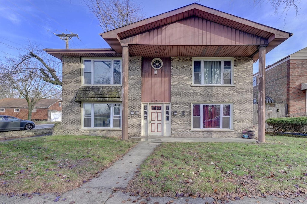 front of property with a front yard