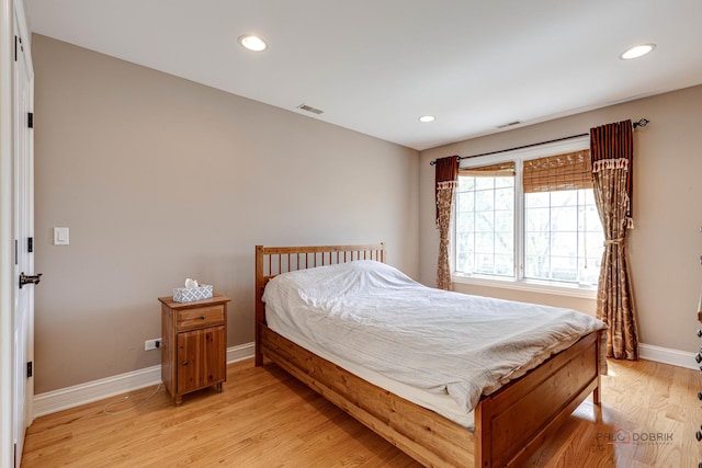 bedroom featuring light hardwood / wood-style floors