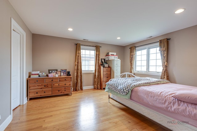 bedroom featuring light wood-type flooring