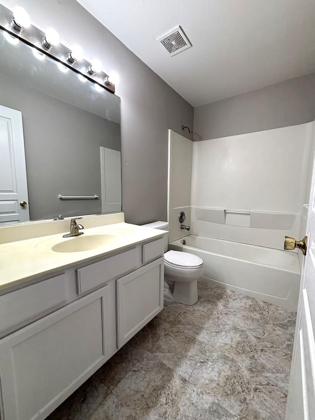 full bathroom with vanity, toilet, and shower / tub combination