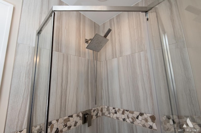 interior space with tiled shower