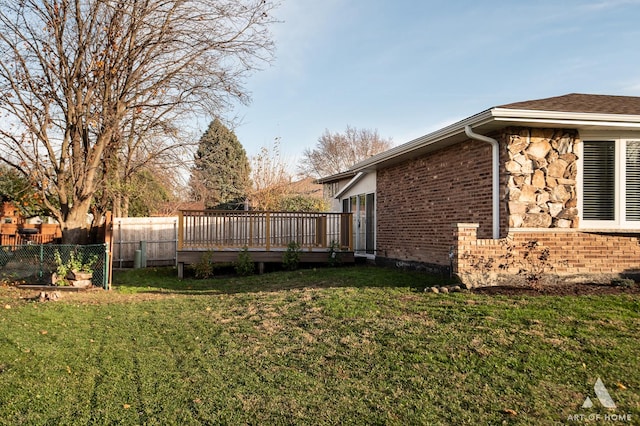 view of yard with a deck