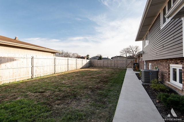 view of yard featuring central AC