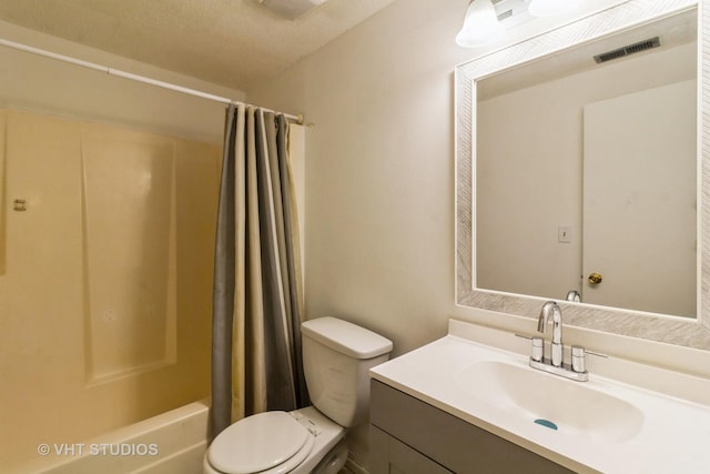 full bathroom with vanity, a textured ceiling, toilet, and shower / bathtub combination with curtain