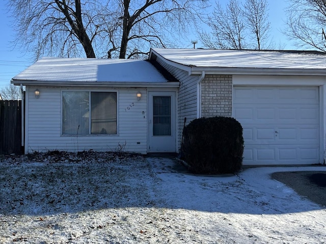 single story home with a garage