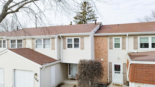 multi unit property with roof with shingles