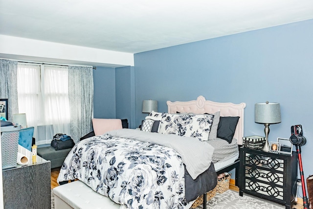 bedroom featuring wood finished floors